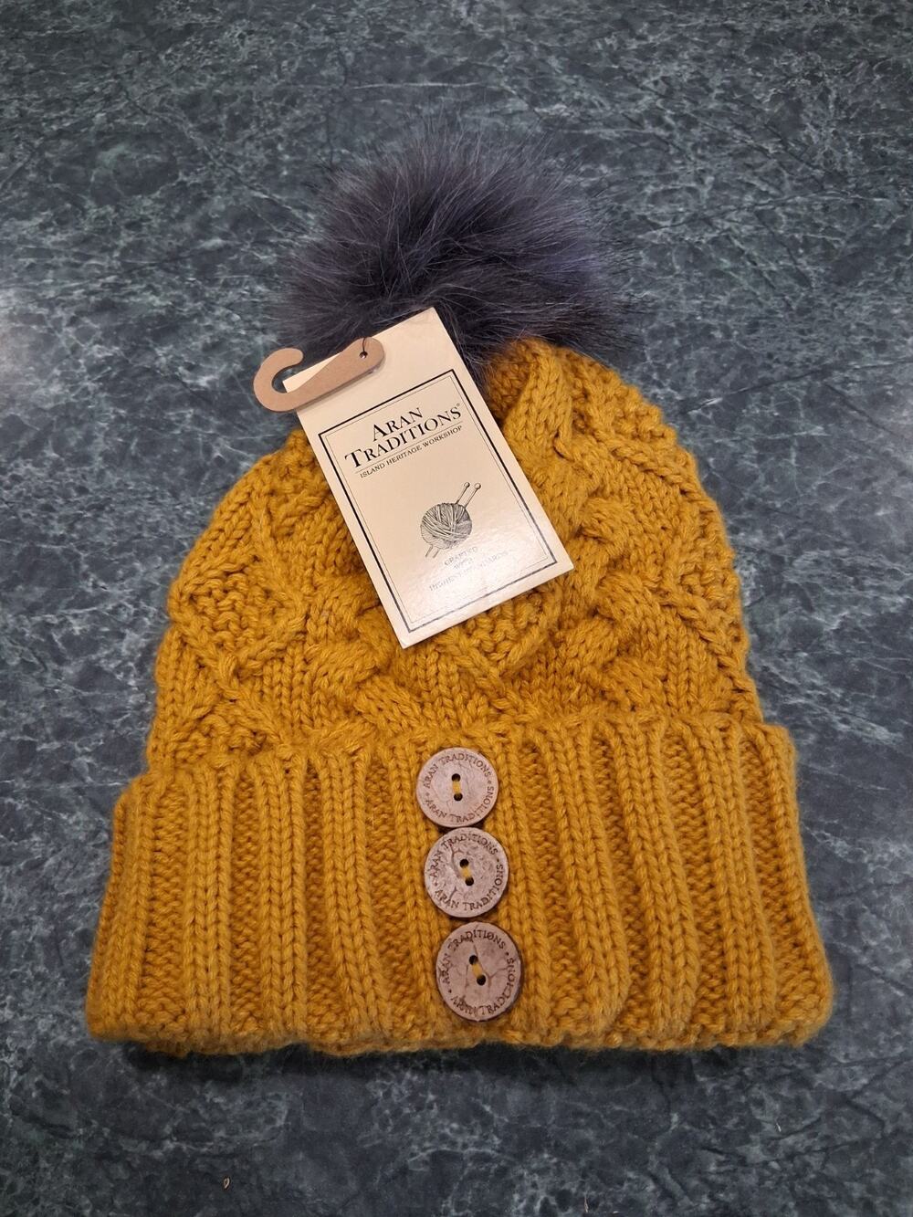 Aran Traditions Fur Pom Hat Beanie Womens One Size Mustard Ochre Chunky Knit NWT